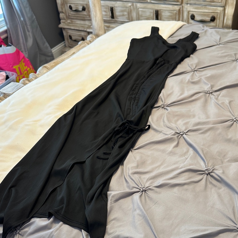 Elegant Black Sleeveless Maxi Dress with Side Tie Detail